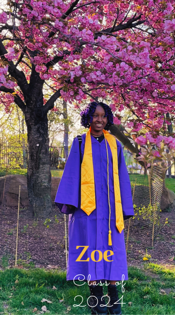 Zoe in a purple cap and gold sash, smiling under a blossoming cherry tree — Class of 2024.